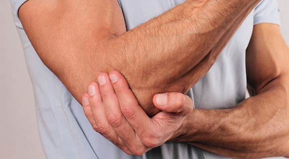 Our chiropractors treat elbow pain in Andover